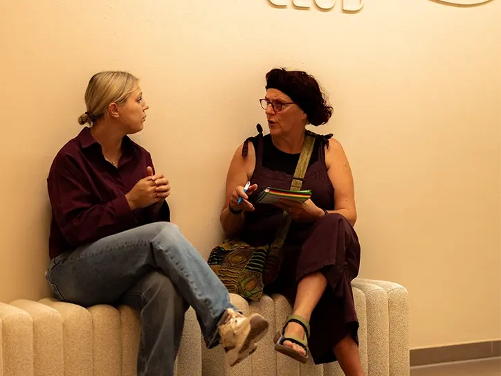 LAGO CLUB Boutique Brugge gesprek coach en lid